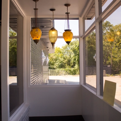 3 lights in the entrance of the restaurant
